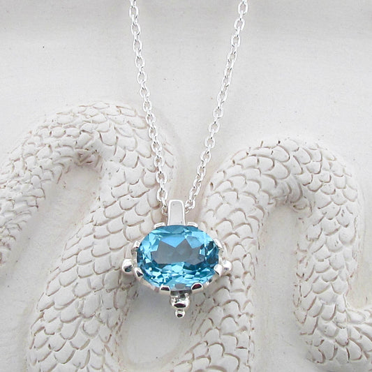 Sterling Silver Blue Topaz Oval claw set Pendant Necklace