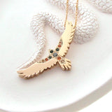 Yellow Gold open-winged eagle tourmaline and sapphire pendant
