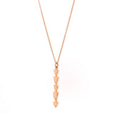 rose gold chasing arrows pendant