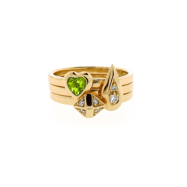 yellow gold diamond peridot ring stacking set