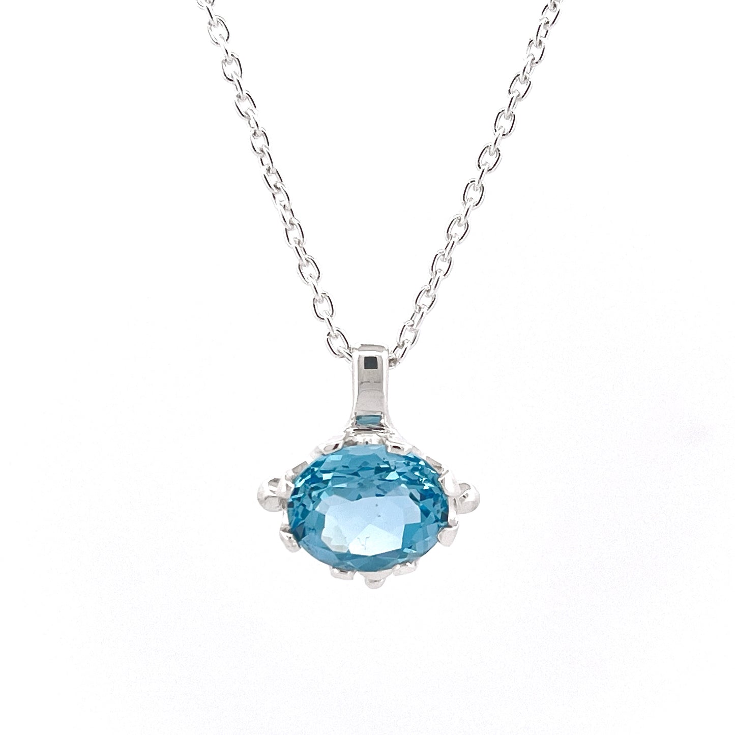 Sterling Silver  Blue Topaz Oval claw set Pendant Necklace