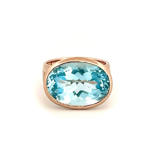 Rose Gold Blue Topaz Horizon Ring