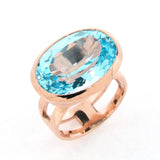 Rose Gold Blue Topaz Horizon Ring