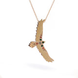 Yellow Gold open-winged eagle tourmaline and sapphire pendant