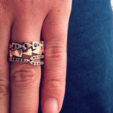 white gold black spinel chasing arrows stackable band