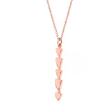 rose gold chasing arrows pendant