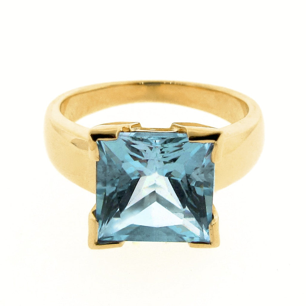Princess cut sales blue topaz ring