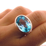 Rose Gold Blue Topaz Horizon Ring