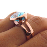 Rose Gold Blue Topaz Horizon Ring